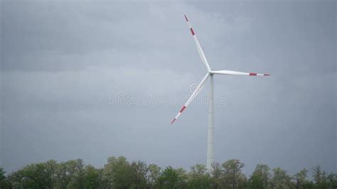 Large Wind Turbines With Blades In Field Aerial View Bright Orange