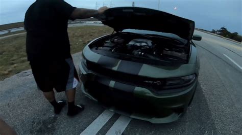 Tuned Dodge Charger Hellcat Races Mclaren 720s Someone Gets Taught A