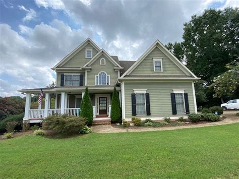 New Look For Cumming GA House With Sherwin Williams Siding Color SW