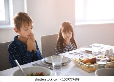 Cute Children Praying Before Meal Home Stock Photo 1309777699 | Shutterstock