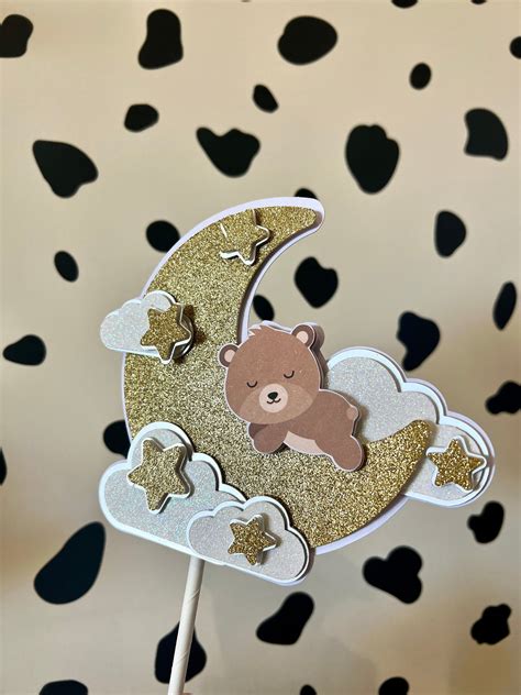 A Beautiful Sparkly Moon And Bear Cake Topper Ideal For A Birthday Or