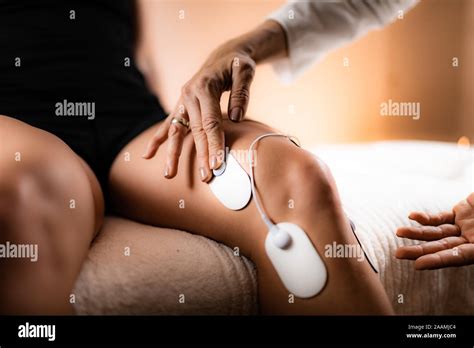 Transcutaneous Electro Nerve Stimulation Hi Res Stock Photography And