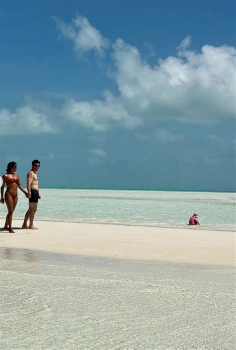 Priyanka Chopra Dons A Bikini And Kisses Nick Jonas On The Beach