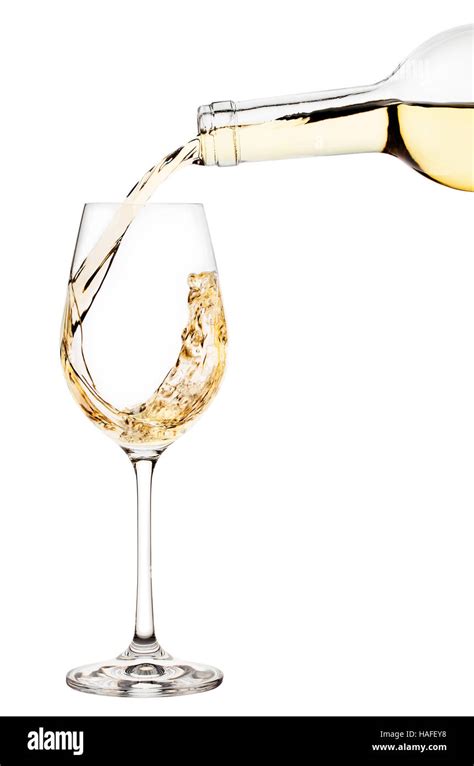 White Wine Is Poured Into Wine Glass Isolated On White Background Stock