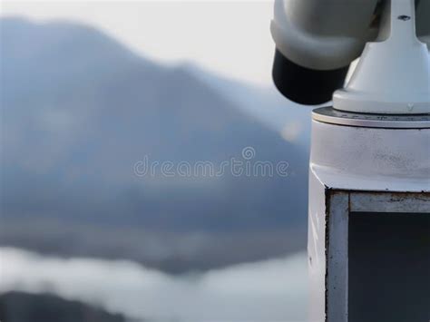 Paid Outdoor Tourist Telescope Against The Backdrop Of Extending