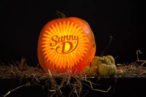 The precise art of carving logos into pumpkins