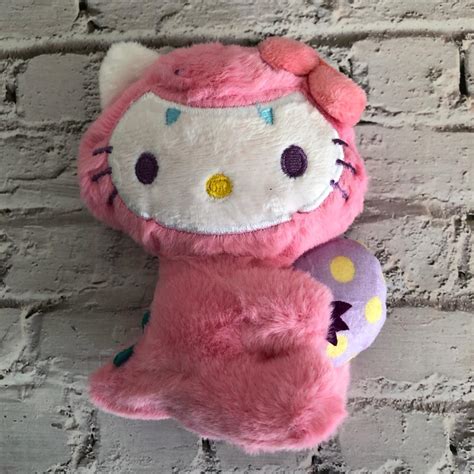 Hello Kitty dinosaur plushie... - Depop