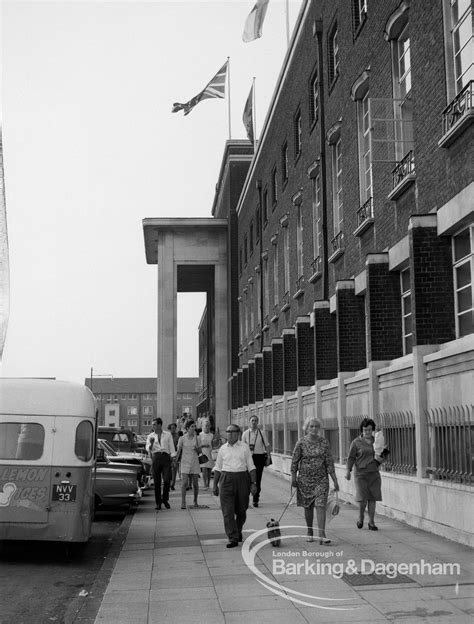 Dagenham Town Show 1969, showing group of visitors leaving and crossing