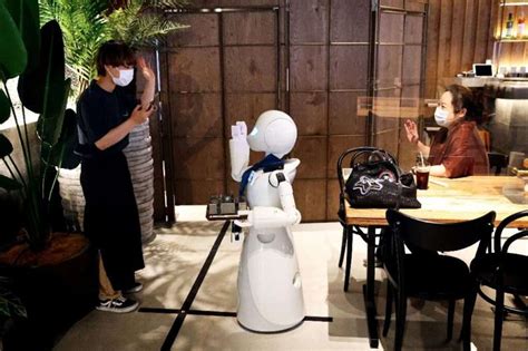 Tokyo robot cafe offers new spin on disability inclusion