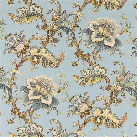 a blue floral wallpaper with white and yellow flowers on the bottom ...