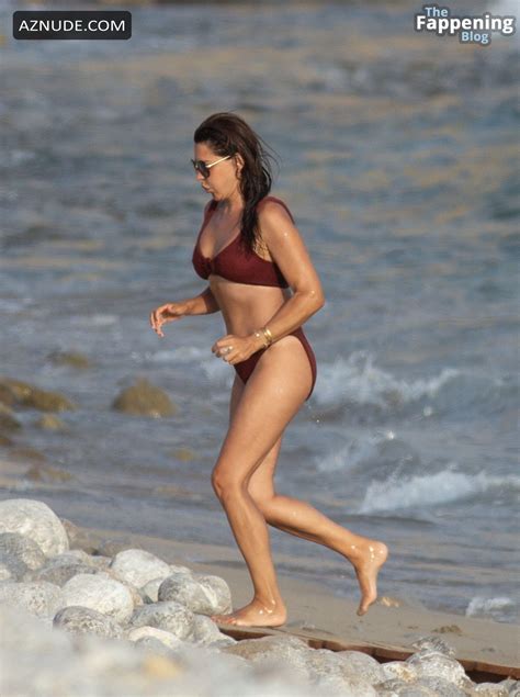 Danielle Bux Flaunts Her Sexy Curves In A Burgundy Bikini In Ibiza AZNude