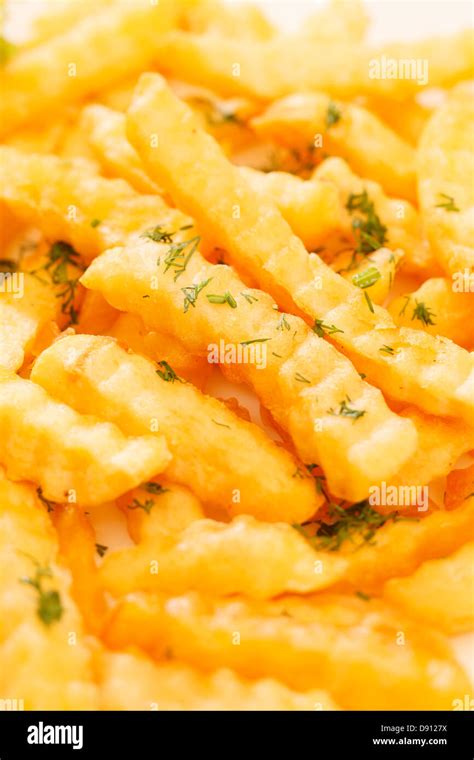 Golden French fries potatoes Stock Photo - Alamy