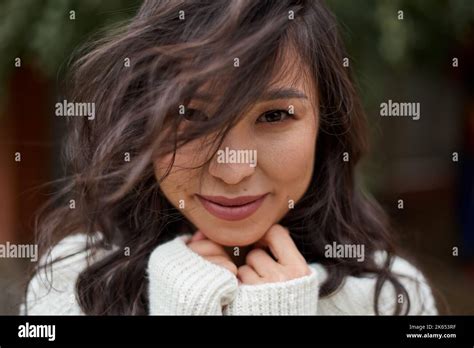 Beautiful Asian Kazakh Brunette Woman With Flying Long Hair Stock Photo Alamy