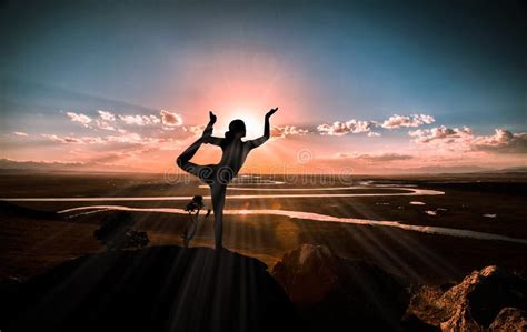 Young Woman Enjoying Yoga from the Top of a Mountain Stock Photo - Image of clouds, landscape ...