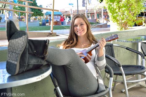 Brown Haired Babe With A Winning Smile Plays Guitar With Her Tits Out FTV Girls