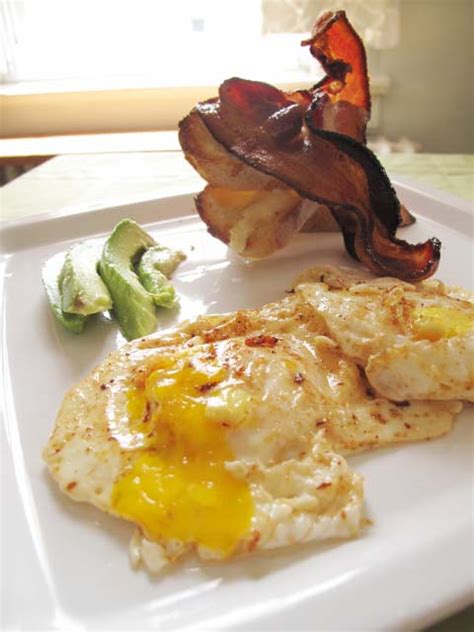 Eggs Over Easy And Applewood Smoked Bacon Rich In Taste