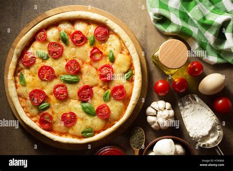 Italian Pizza At Old Surface Background Stock Photo Alamy