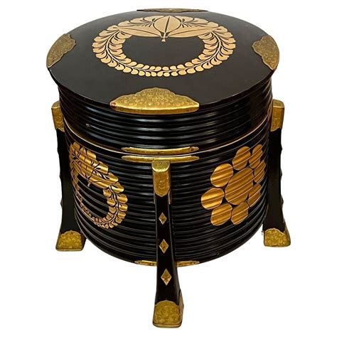 A Japanese Meiji Period Black Lacquer Hokai Lidded Box With Brass