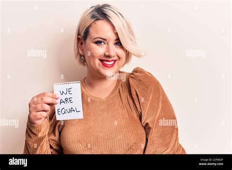 Beautiful Blonde Plus Size Woman Asking For Equality Holding Paper With We Are Equal Message