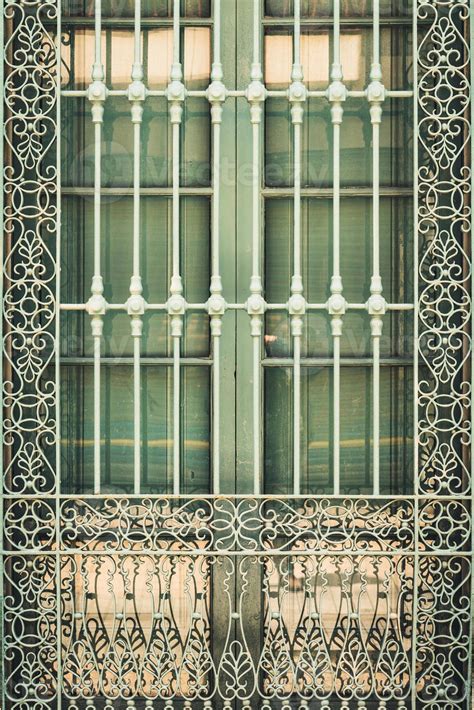 Antique wrought iron window grill 1990492 Stock Photo at Vecteezy