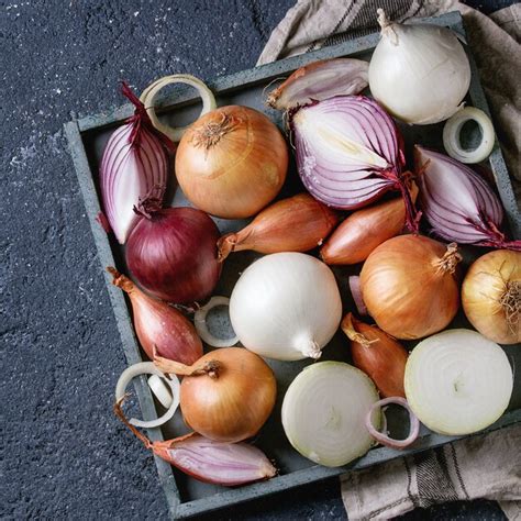 Premium Photo Variety Of Whole And Sliced Onion