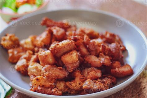 Fried Pork Belly With Fish Sauce And Sticky Rice Served On A White