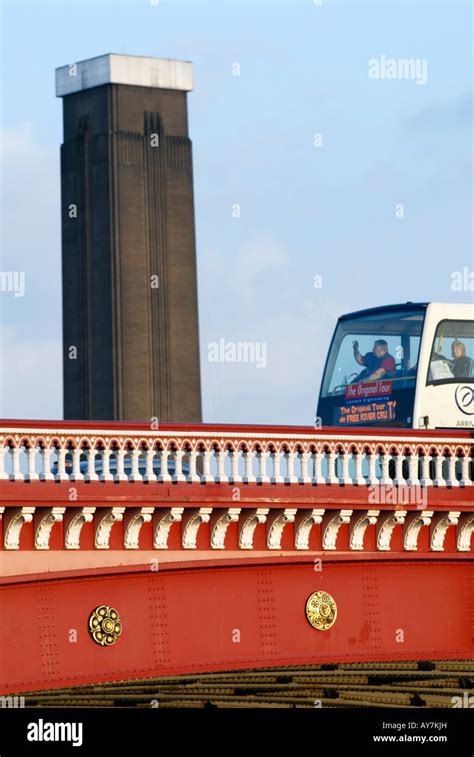 Uk Tourist Bus Crossing Blackfriars Bridge With Tate Modern In