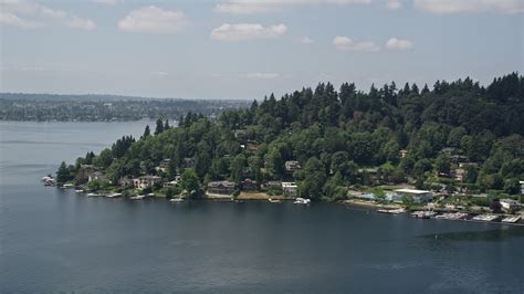 5k Stock Footage Aerial Video Of Lakeside Homes With Small Docks On