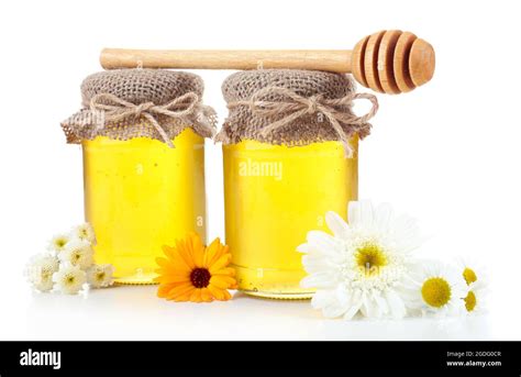 Jar full of delicious fresh honey and wild flowers, isolated on white ...