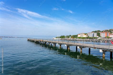 Portoroz central beach with pier and resort buildings Stock Photo ...