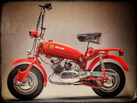 A Red Motorcycle Parked In Front Of A Wall