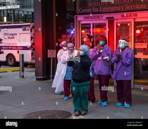 New York, NY - April 10, 2020: Nurses, doctors and medical staff of NYU Langone hospital were ...