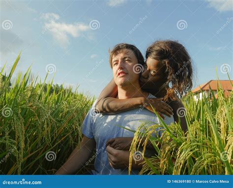 Young Happy And Beautiful Mixed Ethnicity Couple With Black African