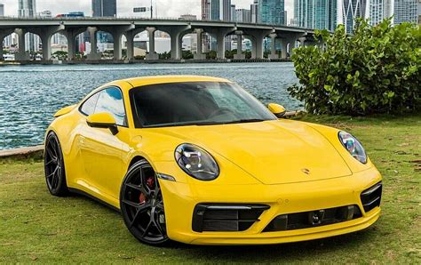 Porsche 911 Yellow 2022 Rental in Dubai | Pugachev Luxury Cars