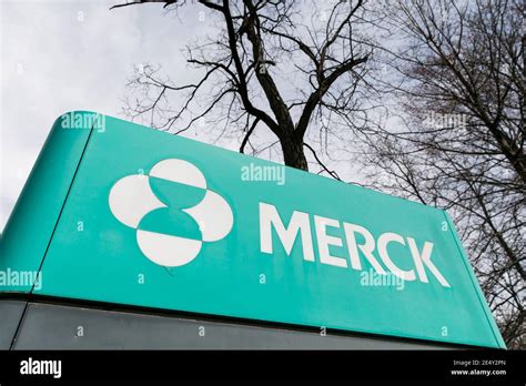 A logo sign outside of a facility occupied by Merck & Company, Inc., in ...