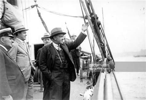 ernest shackleton waving goodbye   embarks   antarctica
