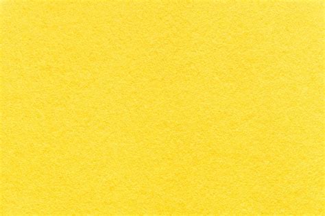 Texture Du Vieux Fond De Papier Jaune Clair Agrandi Photo Premium