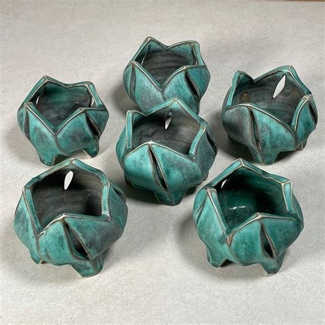 (6pc) ART POTTERY CANDLE HOLDERS