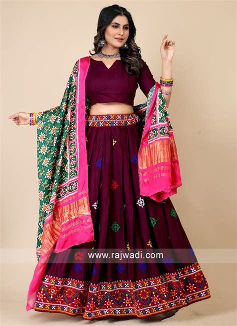 Exquisite Wine Chaniya Choli With Patola Printed Dupatta