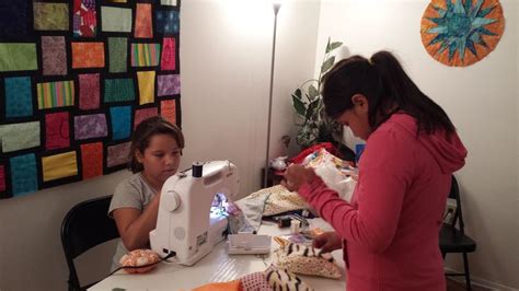 Learning to sew at Wounded Knee District School with our donations of fabric and supplies #FoPRR ...