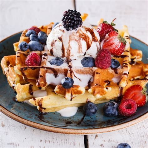 Premium Photo Belgian Waffles With Ice Cream Fresh Berries