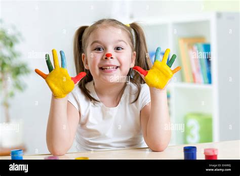 Cute Cheerful Girl Showing Her Painted Hands Stock Photo Alamy