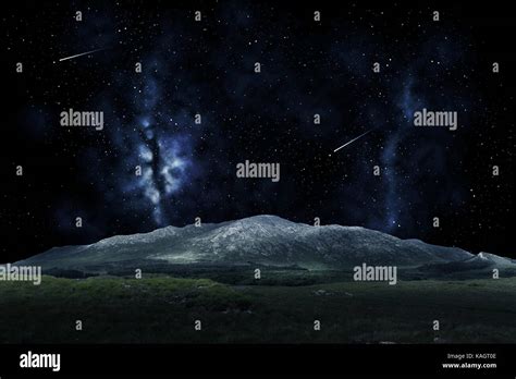 mountain landscape over night sky or space Stock Photo - Alamy