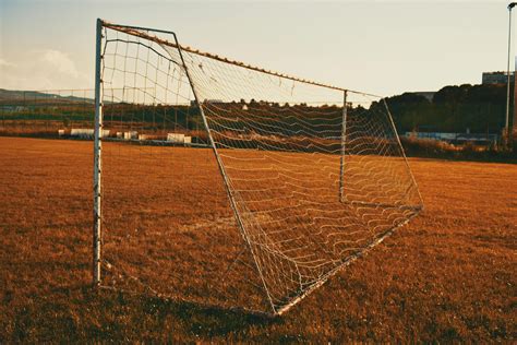 Photography Of White Soccer Goal Post · Free Stock Photo