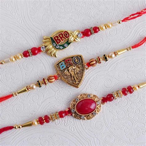 Send Rakhi Set Of Three Golden Rakhi Online