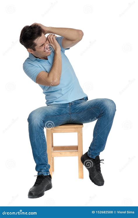 young casual man posing   defensive stance stock photo image