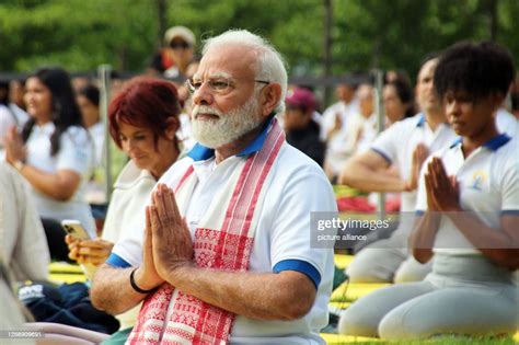 Narendra Modi Prime Minister Of India Practices Yoga With Hundreds