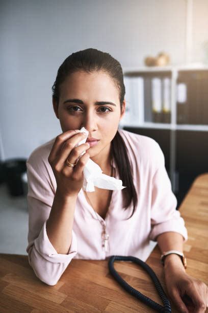 40 Portrait Of Business Woman In Office Blowing Nose Stock Photos