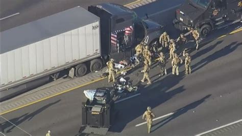 Swat Team Pulls Driver Out Of Big Rig After Hours Long Standoff On Busy Houston Freeway