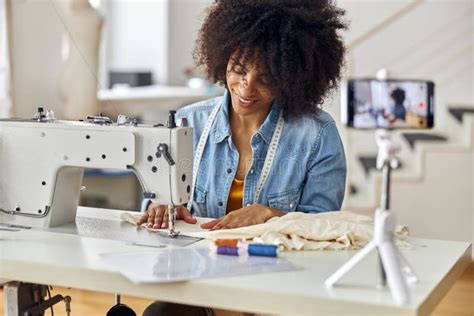 African American Seamstress Sews Clothes Shooting Video For Blog In